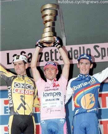 The 2001 Giro d'Italia podium. The only Giro or Tour podium full of riders who competed in that year's Vuelta.