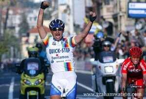 Paolo Bettini winning Milan San Remo wearing the leader's jersey of the now defunct World Cup.