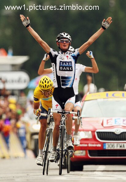 Frank Schleck celebrates winning a stage of last year's Tour de France with his brother celebrating behind him. But they didn't manage to shake Alberto Contador.