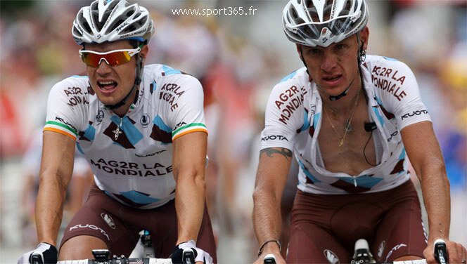 Nicolas Roche and John Gadret cross the line together during the 2010 Tour. Roche was unimpressed with Gadret's refusal to lend him a wheel on Stage 15